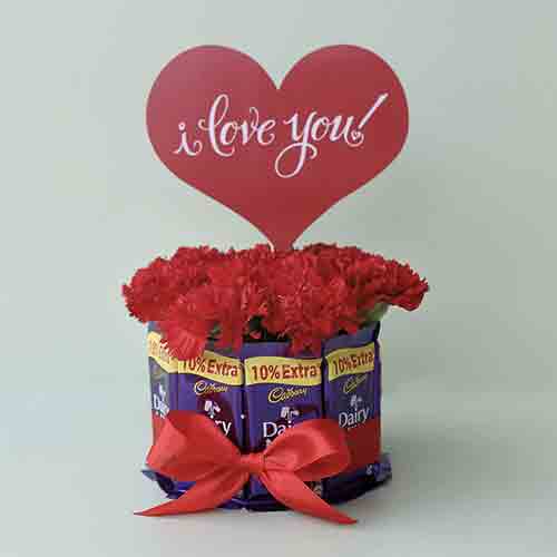 Carnations Dairy Milk Chocolate Bouquet dairy milk chocolatecakegift.in